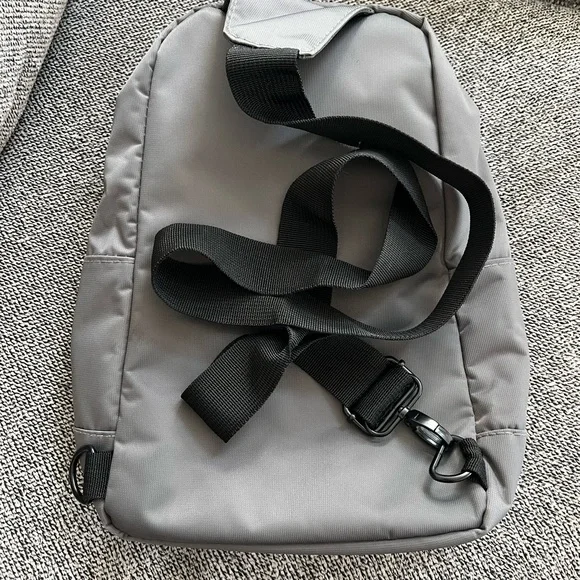 Gray Modern Minimalist Backpack with Water-Resistant Finish - Picture 2 of 7